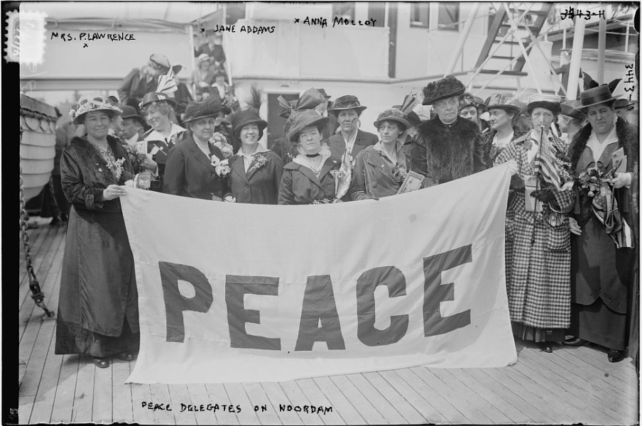 American delegates, including Jane Addams (front row, second from the left), on their way to the International Congress of Women, held at The Hague in 1915. From the Library of Congress.